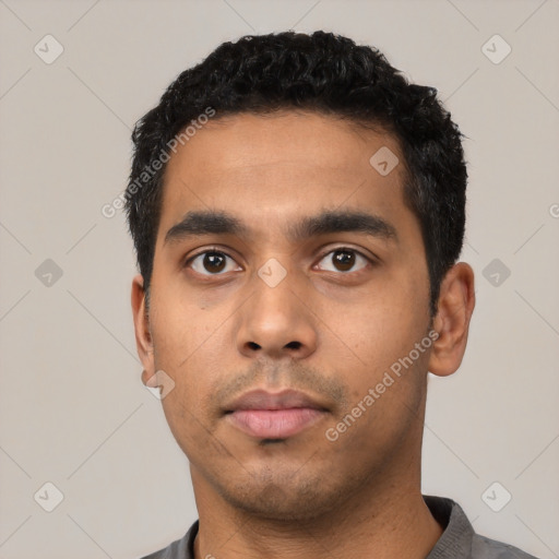 Neutral latino young-adult male with short  black hair and brown eyes