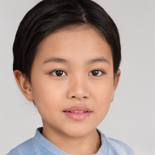 Joyful white child female with short  brown hair and brown eyes