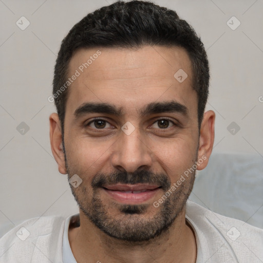 Joyful white young-adult male with short  black hair and brown eyes