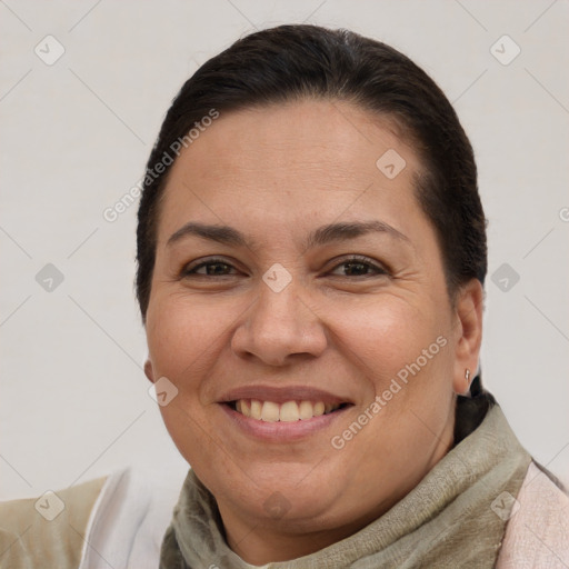 Joyful white adult female with short  brown hair and brown eyes