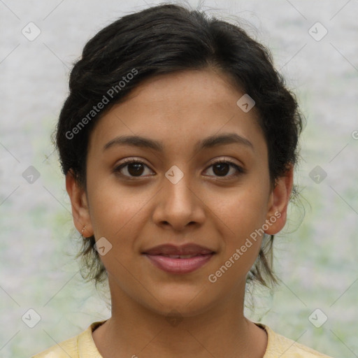 Joyful latino young-adult female with short  brown hair and brown eyes