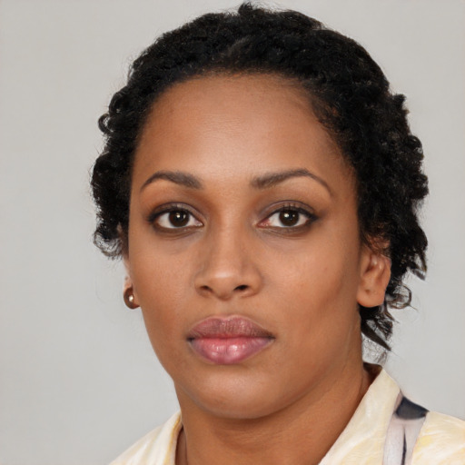 Neutral black young-adult female with long  black hair and brown eyes