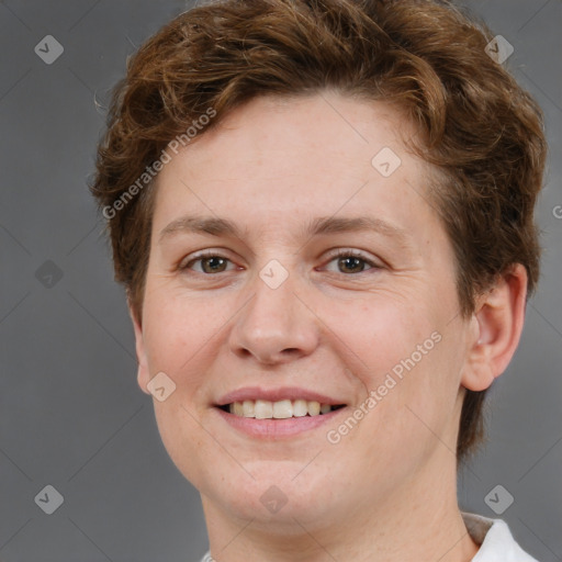 Joyful white adult female with short  brown hair and brown eyes