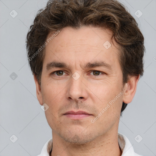 Neutral white adult male with short  brown hair and brown eyes