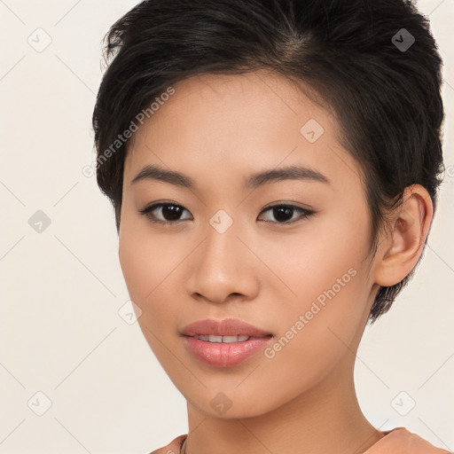 Joyful asian young-adult female with long  brown hair and brown eyes