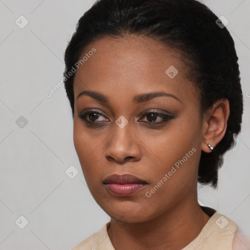 Neutral black young-adult female with short  black hair and brown eyes