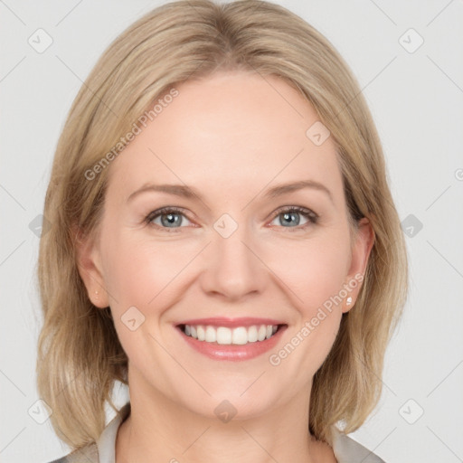 Joyful white young-adult female with medium  brown hair and blue eyes