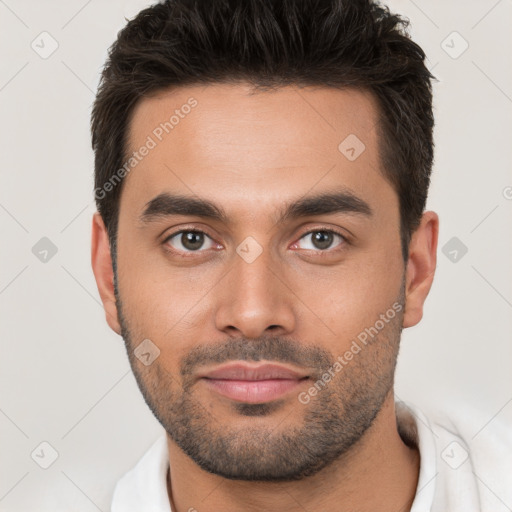 Neutral white young-adult male with short  brown hair and brown eyes