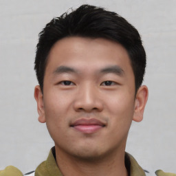 Neutral asian young-adult male with short  black hair and brown eyes