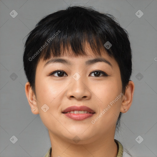 Joyful asian young-adult female with short  brown hair and brown eyes