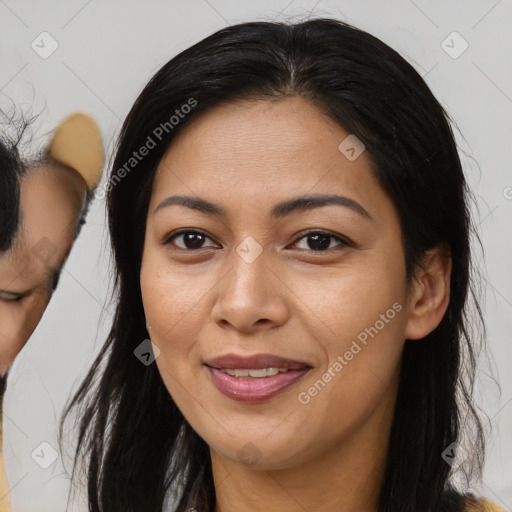 Joyful asian young-adult female with medium  brown hair and brown eyes