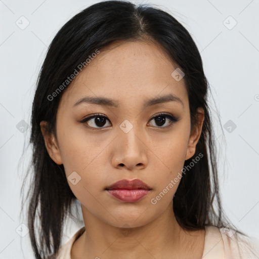 Neutral asian young-adult female with medium  brown hair and brown eyes