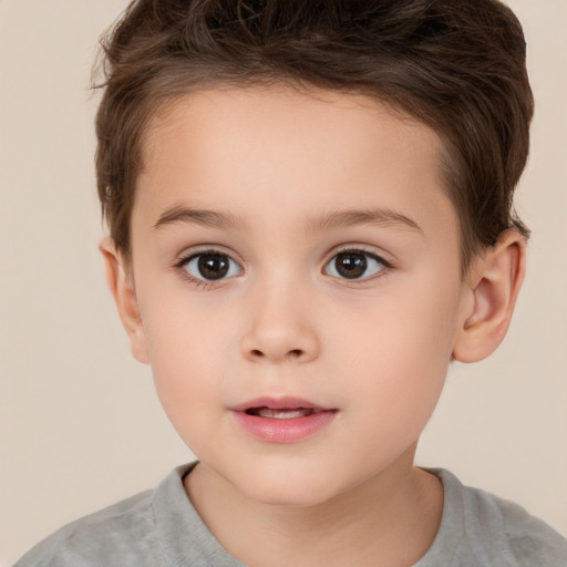 Joyful white child female with short  brown hair and brown eyes