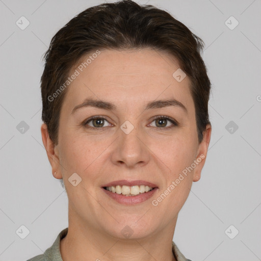 Joyful white young-adult female with short  brown hair and grey eyes