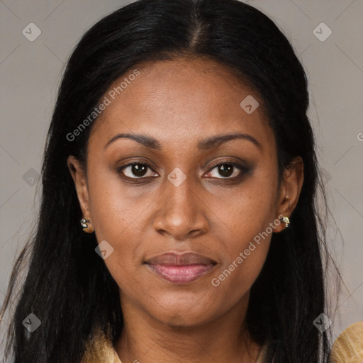 Joyful black young-adult female with long  brown hair and brown eyes