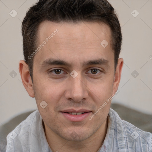 Joyful white adult male with short  brown hair and brown eyes