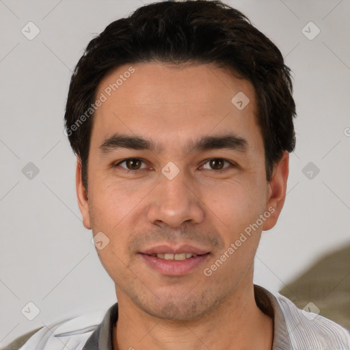 Joyful white young-adult male with short  black hair and brown eyes