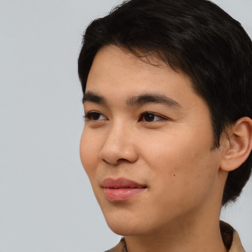 Neutral asian young-adult male with short  black hair and brown eyes