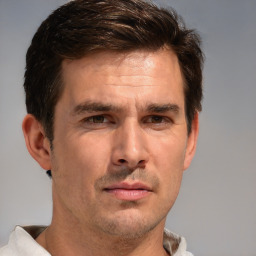 Neutral white adult male with short  brown hair and brown eyes