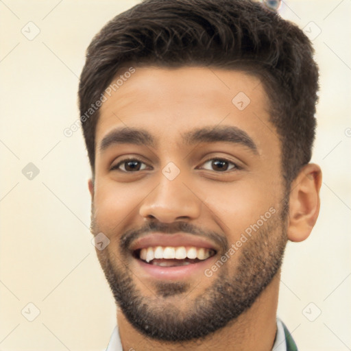 Joyful latino young-adult male with short  black hair and brown eyes