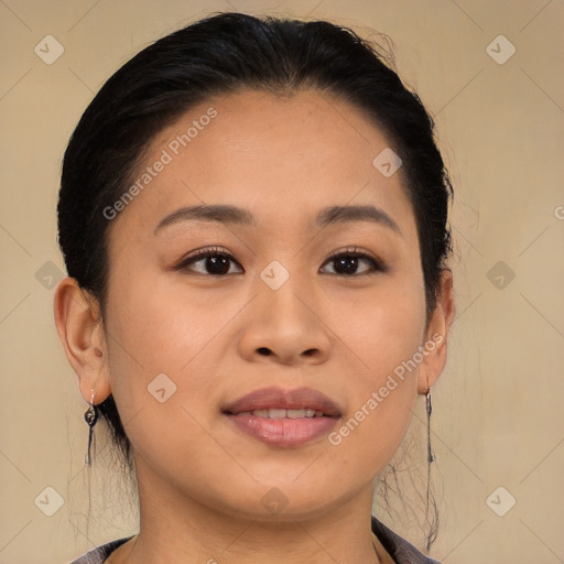 Joyful asian young-adult female with long  brown hair and brown eyes