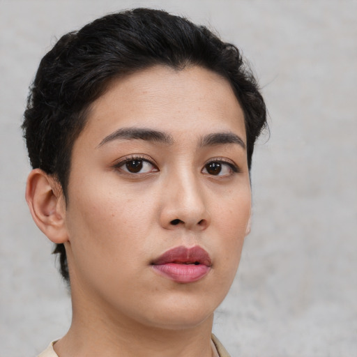 Neutral white young-adult female with short  brown hair and brown eyes
