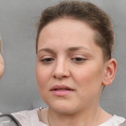 Neutral white young-adult female with short  brown hair and brown eyes