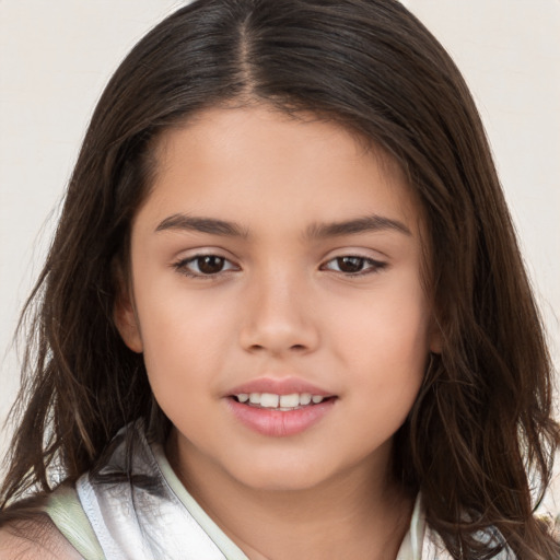 Joyful white child female with long  brown hair and brown eyes