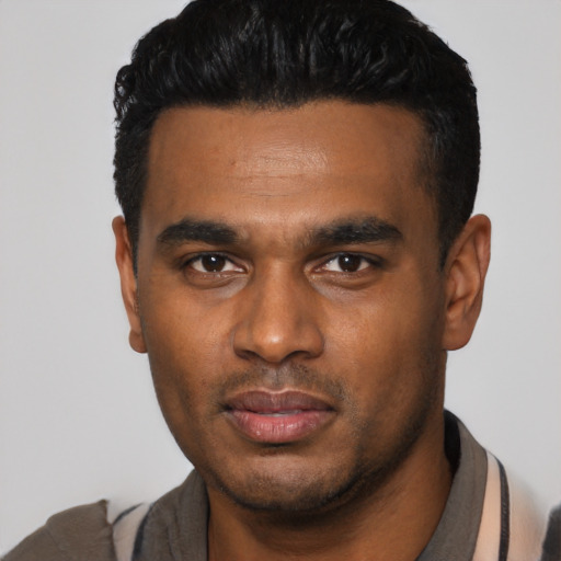 Neutral latino young-adult male with short  black hair and brown eyes