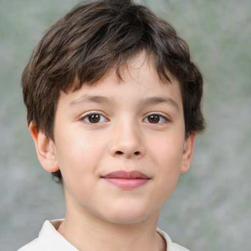 Joyful white child male with short  brown hair and brown eyes
