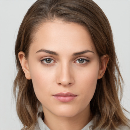 Neutral white young-adult female with medium  brown hair and brown eyes