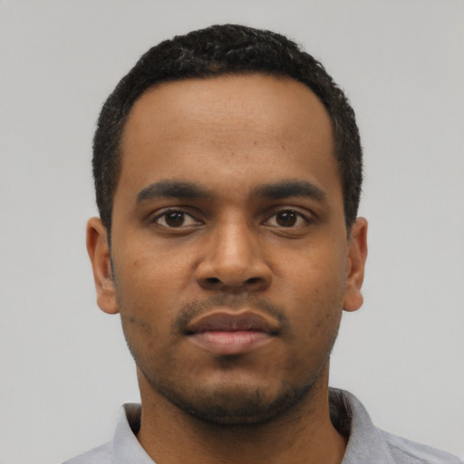 Neutral black young-adult male with short  black hair and brown eyes