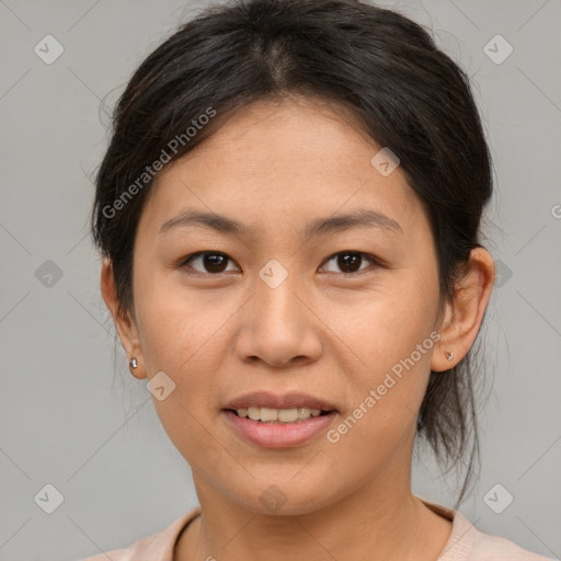 Joyful asian young-adult female with medium  brown hair and brown eyes