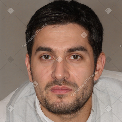 Joyful white young-adult male with short  black hair and brown eyes