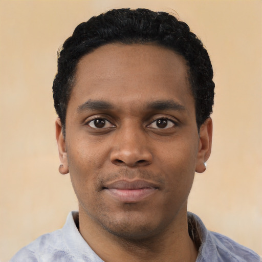 Neutral black young-adult male with short  black hair and brown eyes