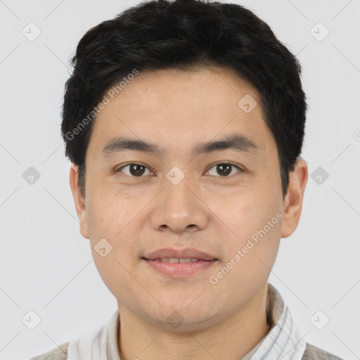 Joyful white young-adult male with short  black hair and brown eyes