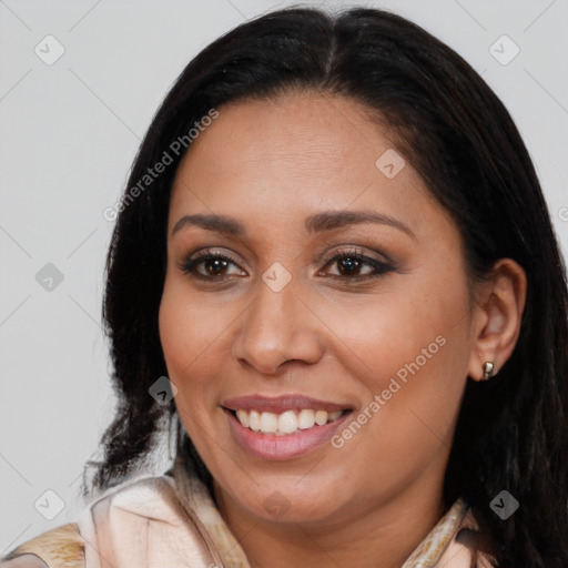 Joyful latino young-adult female with long  brown hair and brown eyes