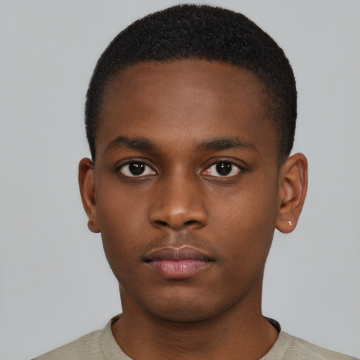 Neutral black young-adult male with short  black hair and brown eyes