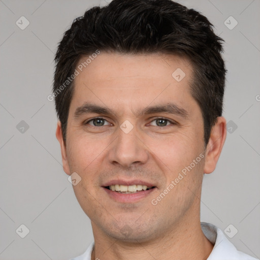 Joyful white young-adult male with short  brown hair and brown eyes