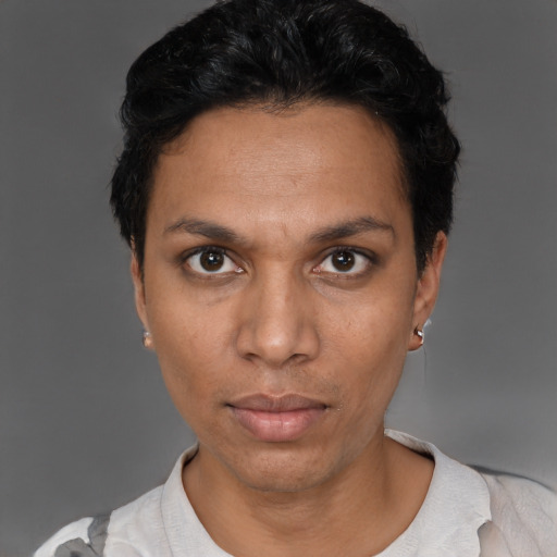 Neutral latino adult female with short  brown hair and brown eyes