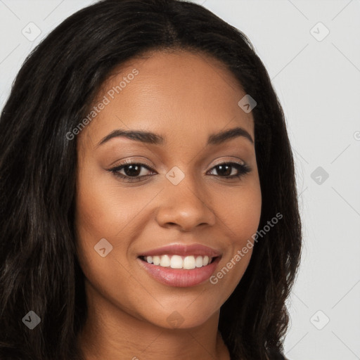 Joyful latino young-adult female with long  brown hair and brown eyes