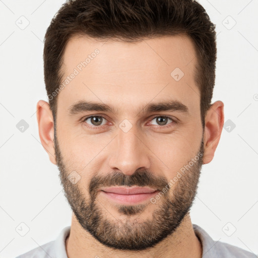 Joyful white young-adult male with short  brown hair and brown eyes