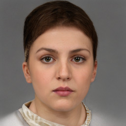 Neutral white young-adult female with short  brown hair and brown eyes