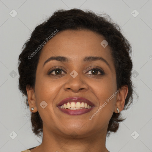 Joyful black young-adult female with medium  brown hair and brown eyes