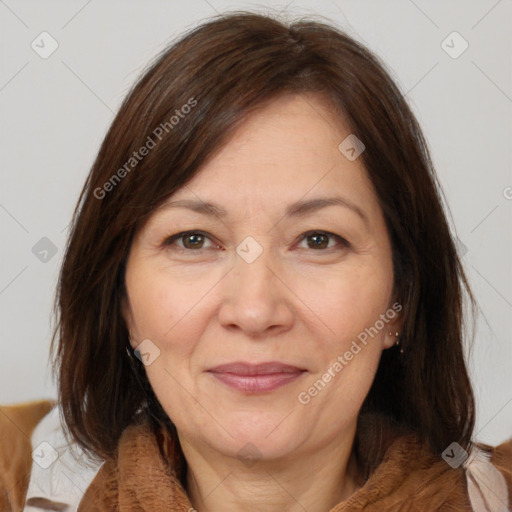 Joyful white adult female with medium  brown hair and brown eyes