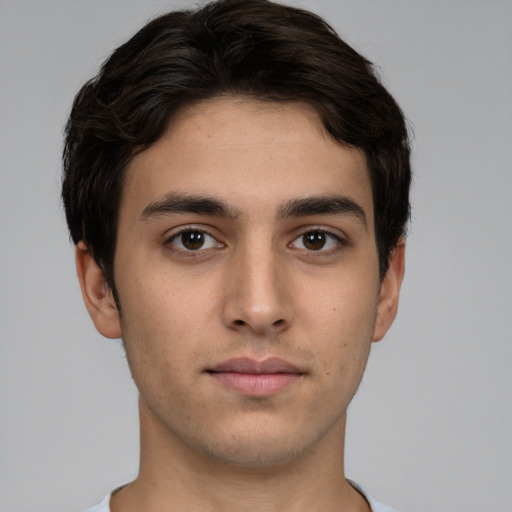 Neutral white young-adult male with short  brown hair and brown eyes