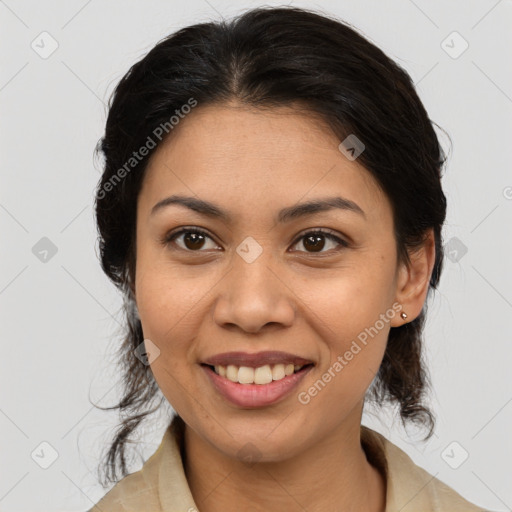 Joyful latino young-adult female with medium  brown hair and brown eyes