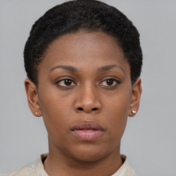 Neutral black young-adult female with short  brown hair and brown eyes