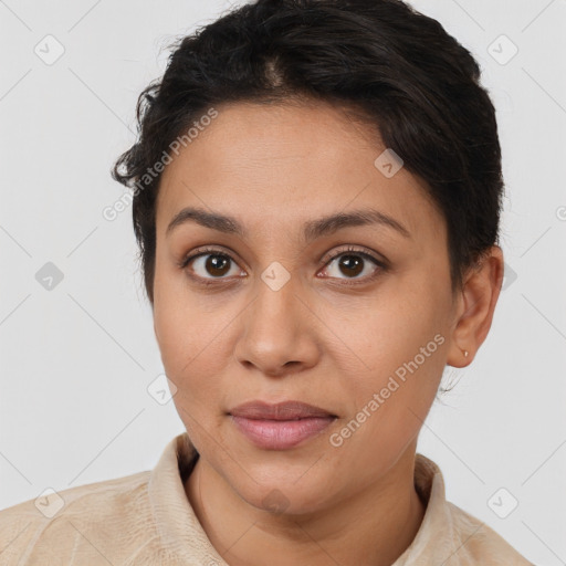 Joyful latino young-adult female with short  brown hair and brown eyes