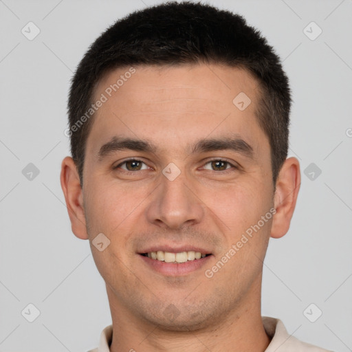 Joyful white young-adult male with short  brown hair and brown eyes